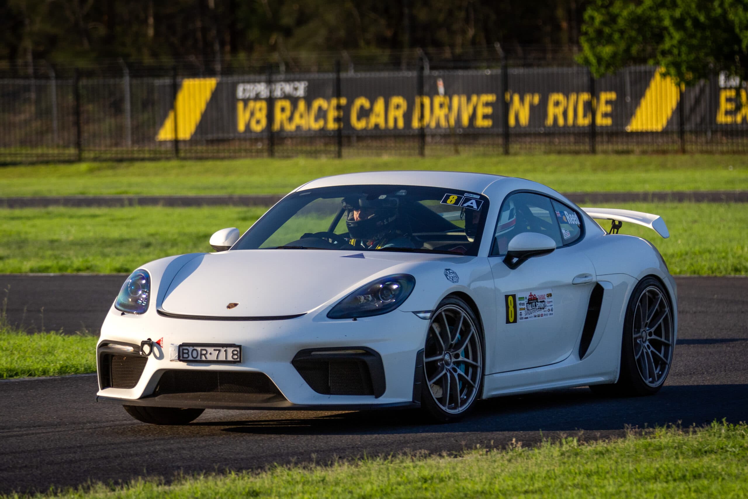 A Porsche Cayman on track at a Tarmac Sprint Series round