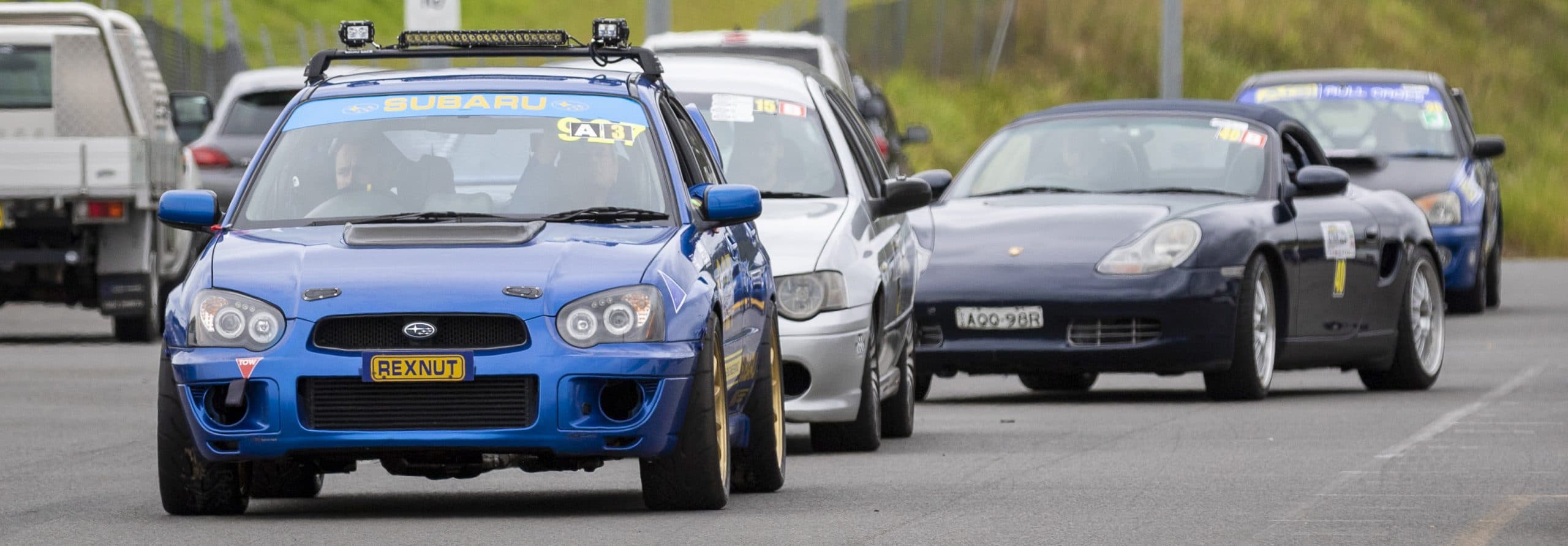 Cars staged in the paddock at a Tarmac Sprint Series round